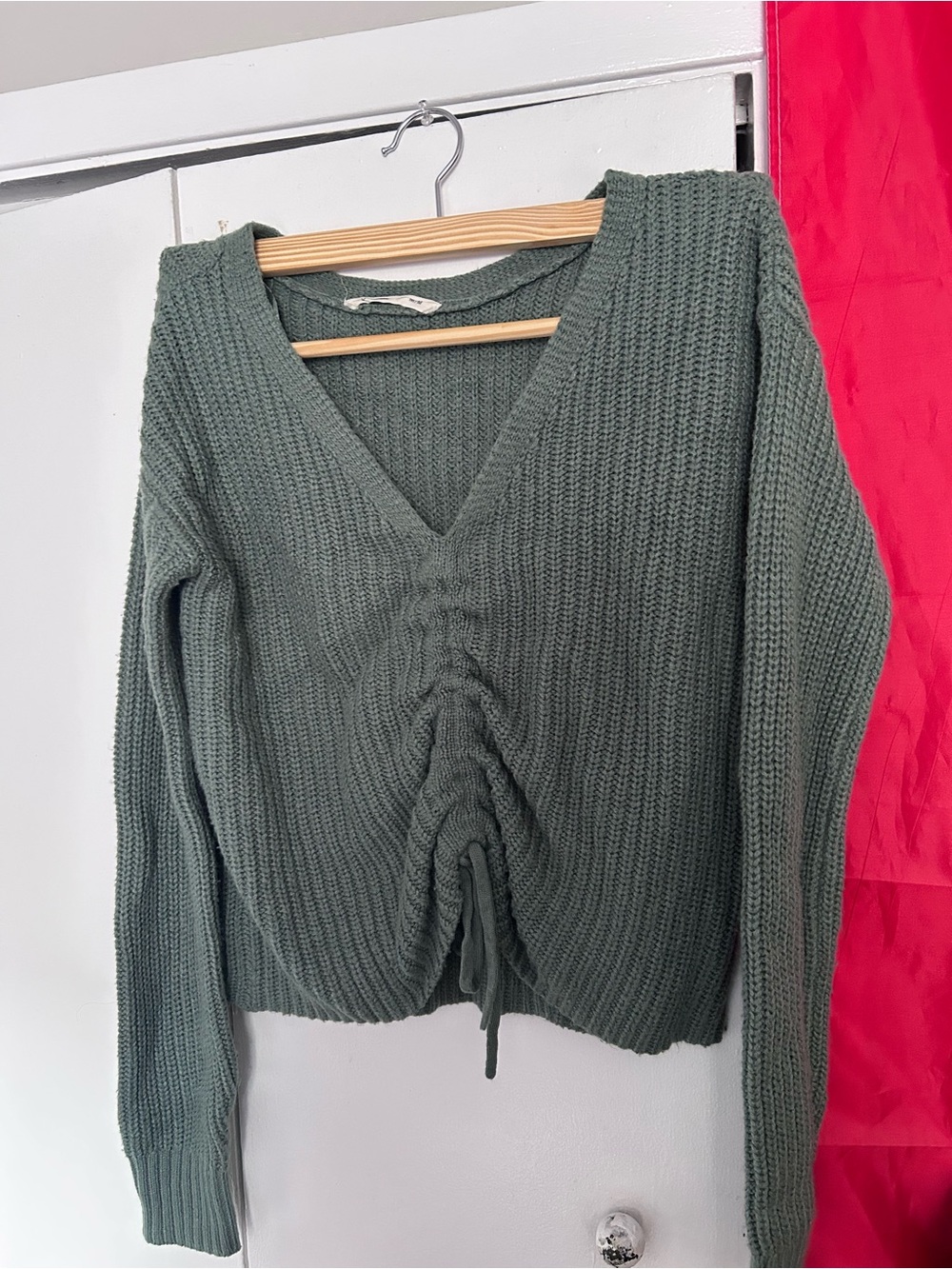 adjustable green knit sweater